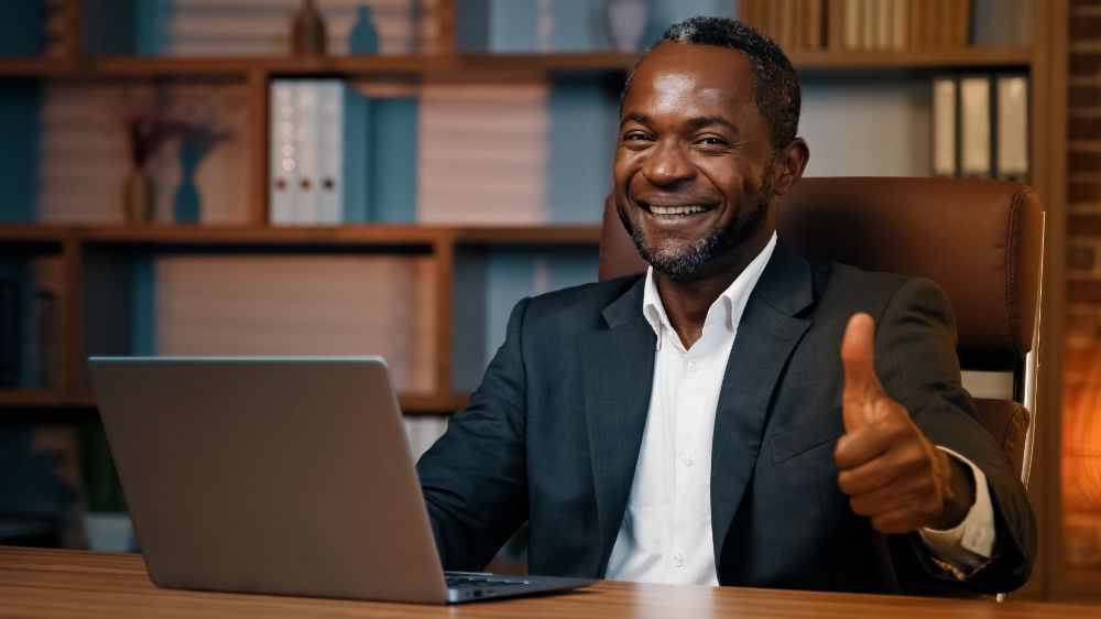 Focused man sitting at a desk